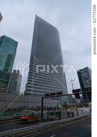 Tokyo Cityscape in Japan: New Coronavirus, Shiodome and Skyscrapers with Dark Clouds (Dentsu Telework) = February 26 62775506