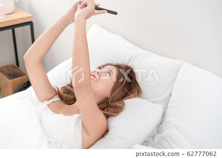 bed, smartphone, female 62777062