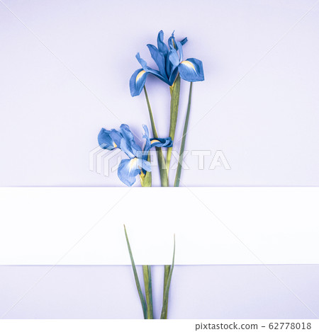 Flower bouquet and white card.  62778018