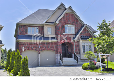 Backyard garden of custom built luxury house in the suburbs of Toronto, Canada. Backyard garden of custom built luxury house in the suburbs of Toronto, Canada. 62778098