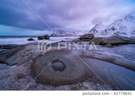 An egg stone. Seascape at Eggum beach in Lofoten An egg stone. Seascape at Eggum beach in Lofoten 62778642