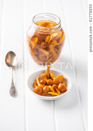 Pickled mushrooms. Marinated mushrooms. 62778850
