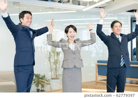 business raising both hands company employee 62779397