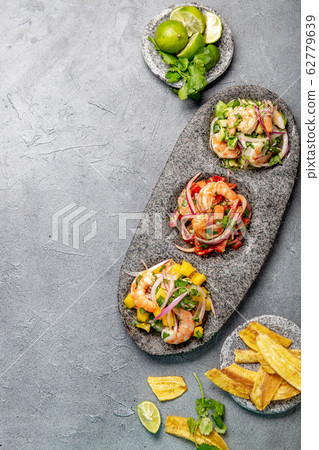 CEVICHE. Three colorful shrimps ceviche with 62779639