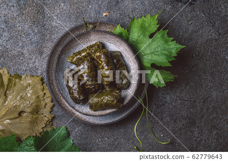 Traditional Middle Eastern dolma or tolma. Grape Traditional Middle Eastern dolma or tolma. Grape 62779643