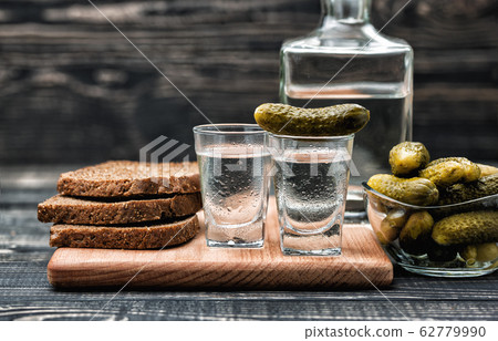 Russian vodka with traditional black bread and 62779990