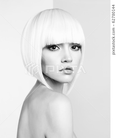 Fashion beautiful blonde with short haircut Fashion beautiful blonde with short haircut 62780144