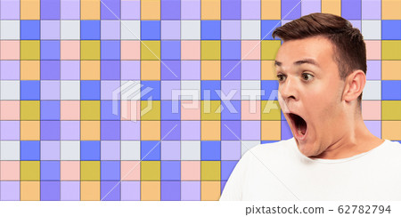 Caucasian man's portrait on mosaic tiles on the background, flyer 62782794