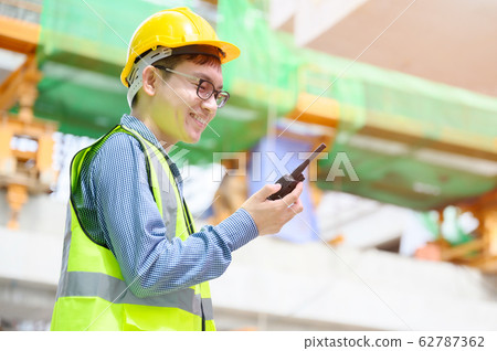 Young asian engineers are working on the construction site 62787362