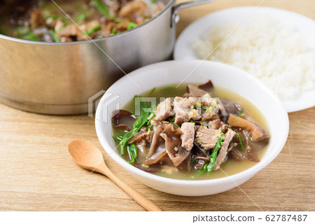 Spicy brown jelly mushroom soup with pork and cooked rice,Local Thai food 62787487