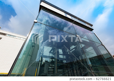 The glass-lined elevator that leads to the Sendai Mori Metropolitan Subway 62788821
