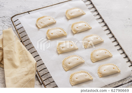 Cooking Spanish Empanadillas 62790669