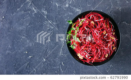 Healthy raw beetroot salad on a bowl, copy space Healthy raw beetroot salad on a bowl, copy space 62791990