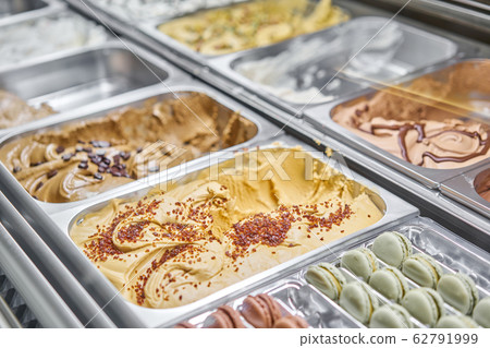 Caramel Gelato. Flavors various ice cream in Rome, Italy. Italian gelateria. Assortment of colorful gelato on cafe showcase. Natural fresh ice cream. 62791999