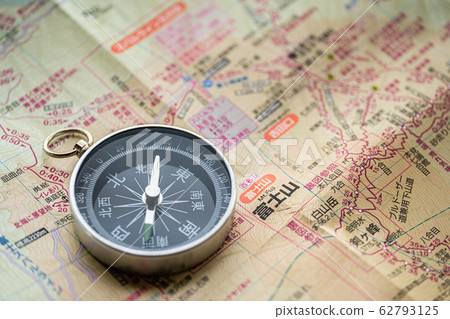 Compass and mountain map 62793125