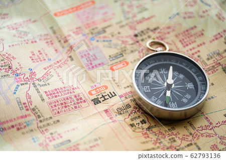 Compass and mountain map Compass and mountain map 62793136