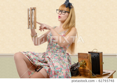 sexy pin up girl with old wood photo camera sexy pin up girl with old wood photo camera 62793748
