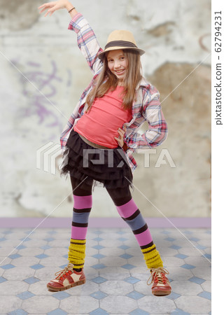 young girl in hipster style with hat young girl in hipster style with hat 62794231