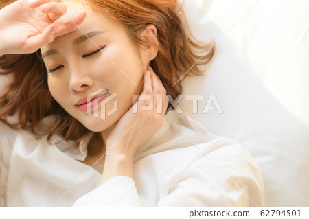 Young woman bedroom lifestyle 62794501