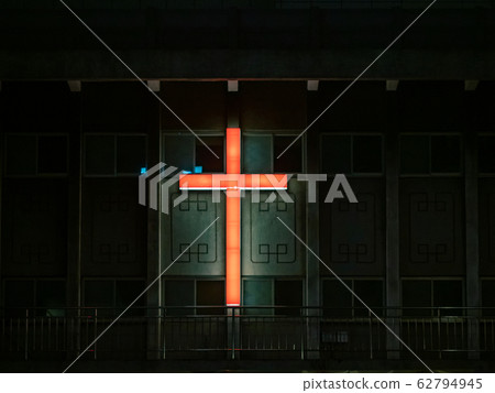 The symbol of the Christian cross is on the roof The symbol of the Christian cross is on the roof 62794945