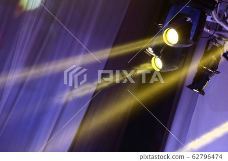 Performance moving lighting on construction light beam ray downward in yellow color 62796474