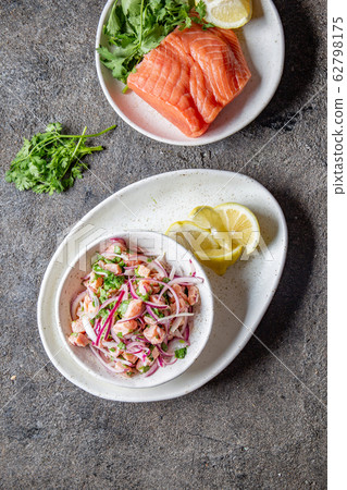 CHILEAN SALMON SEVICHE. Fresh raw salmon marinaded CHILEAN SALMON SEVICHE. Fresh raw salmon marinaded 62798175