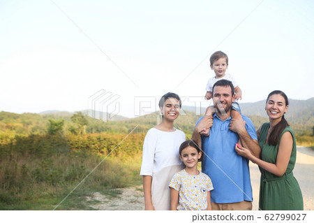 Parents with children in countryside outdoors Parents with children in countryside outdoors 62799027