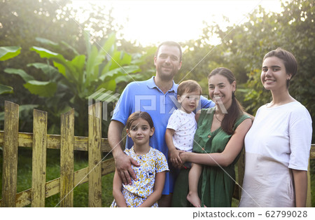 Parents with children in countryside outdoors Parents with children in countryside outdoors 62799028