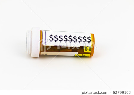 Dollar signs on a prescription pill bottle with a Dollar signs on a prescription pill bottle with a 62799103