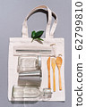 Fabric bags, glass jars, metal straws, bamboo cutlery on grey background with copy space. Eco friendly and reuse concept. Top view. Flat lay. Zero waste concept 62799810