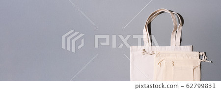 Reusable eco friendly canvas bag on grey background with copy space. Zero waste, plastic free concept. Eco friendly shopper. 62799831