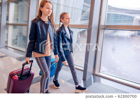 Little kid in airport waiting for boarding 62800700