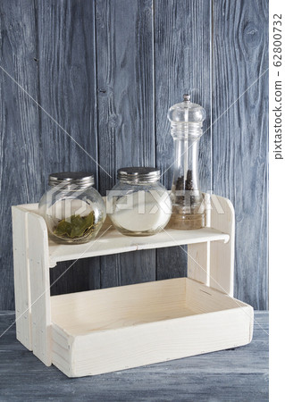 white shelf made of natural wood for spices in white shelf made of natural wood for spices in 62800732