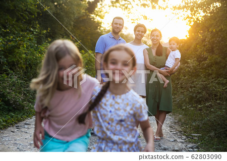 Portrait of the big happy family. Parents with 62803090