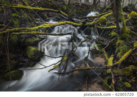 Waterfall in green forest river stream landscape. Beatiful landscape. Waterfall in green forest river stream landscape. Beatiful landscape. 62805720