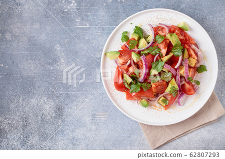 Tomatoes and avocado salad Tomatoes and avocado salad 62807293
