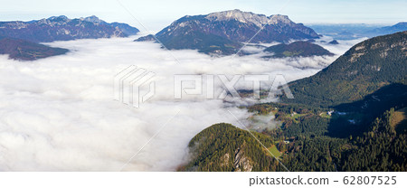 Autumn Alps mountain misty morning view from Autumn Alps mountain misty morning view from 62807525