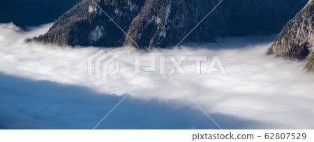 Autumn Alps mountain misty morning view from Autumn Alps mountain misty morning view from 62807529