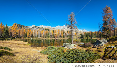 Autumn alpine mountain lake near San Pellegrino Autumn alpine mountain lake near San Pellegrino 62807543
