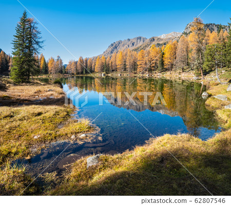Autumn alpine mountain lake near San Pellegrino Autumn alpine mountain lake near San Pellegrino 62807546