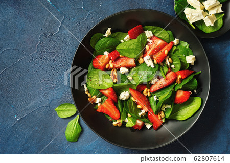 Healthy vegetarian salad with strawberry and 62807614