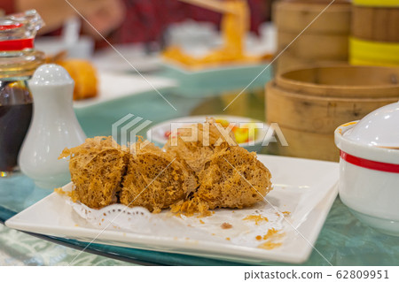 Closeup photo of Hong Kong styled deep-fried taro puff dumpling Closeup photo of Hong Kong styled deep-fried taro puff dumpling 62809951