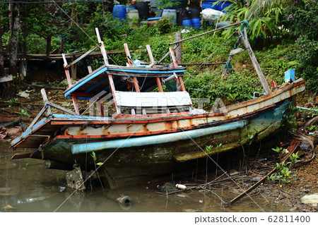 Old Sink fishing boat dock dead along mangrove Old Sink fishing boat dock dead along mangrove 62811400