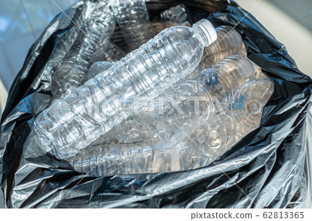 Closeup plastic bottles in trash bag, Global environment problem Closeup plastic bottles in trash bag, Global environment problem 62813365