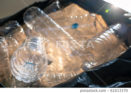 Closeup plastic bottles in trash bag, Global environment problem Closeup plastic bottles in trash bag, Global environment problem 62813370