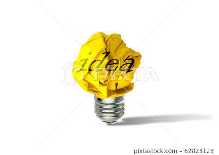 Yellow crumpled paper ball light bulb standing on white floor. Yellow crumpled paper ball light bulb standing on white floor. 62823123