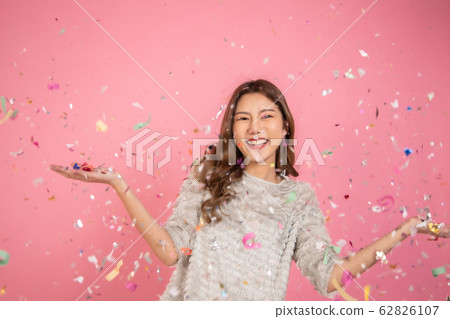 Portrait of a cheerful beautiful Asian womanl Portrait of a cheerful beautiful Asian womanl 62826107