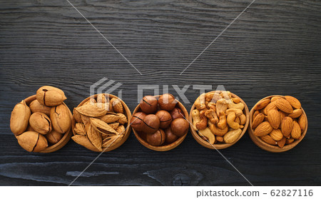 set of nuts in a bowl set of nuts in a bowl 62827116