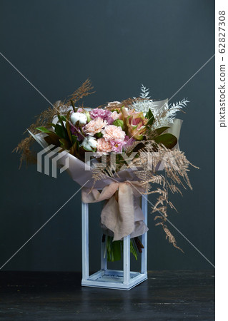 Original bouquet in vintage style on a wooden 62827308