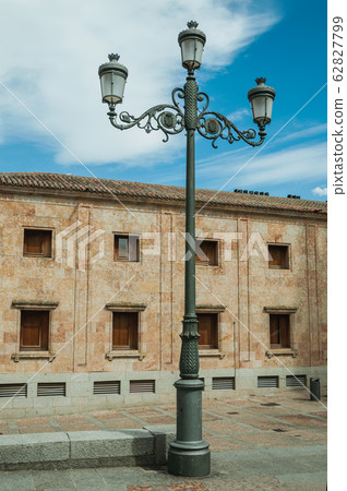 Building with windows and public lamp at Salamanca 62827799